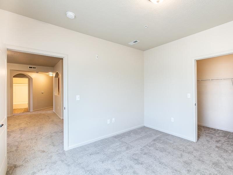 Bedroom and Hallway | The Ridge at Blackmore Apartments in Casper, WY