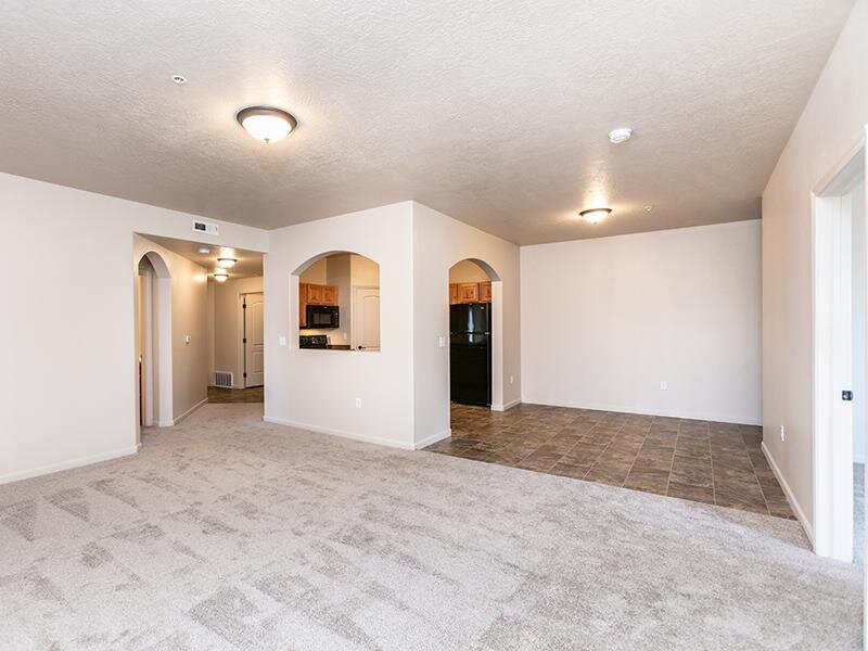 Living Room and Kitchen | The Ridge at Blackmore Apartments in Casper, WY