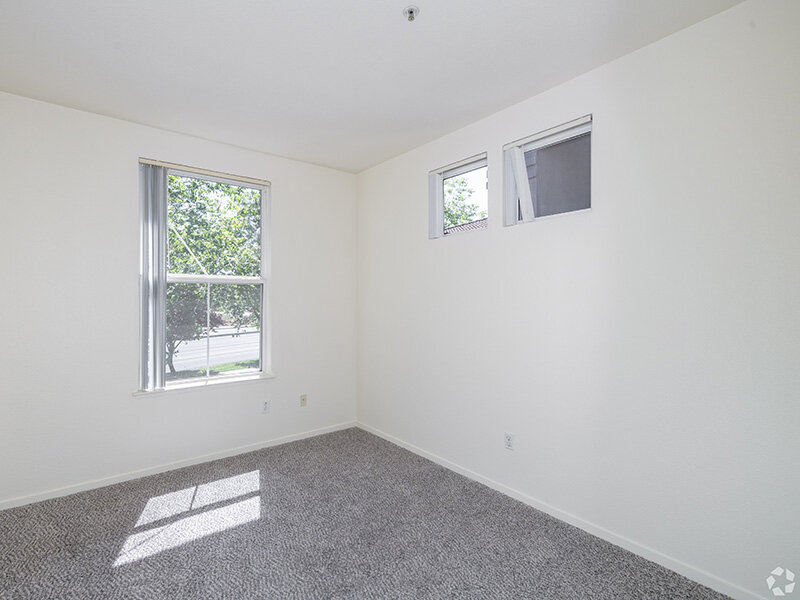 Bedroom with Multiple Windows | Crocker Oaks Apartments