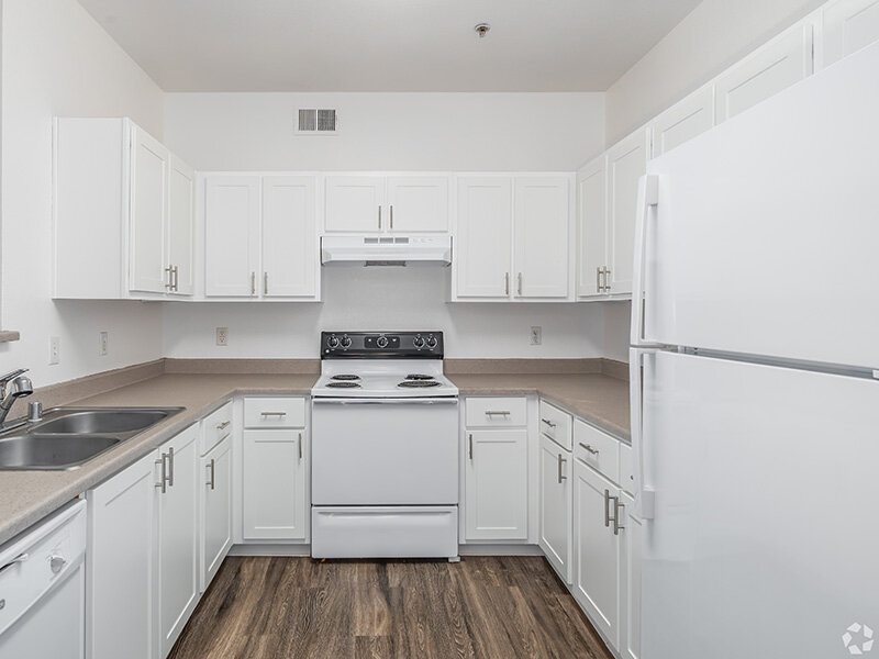 Kitchen with White Cabinets and Matching Appliances | Crocker Oaks Apartments