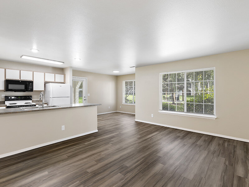 Living Room with Wood Style Flooring and Open Windows | Spring Creek