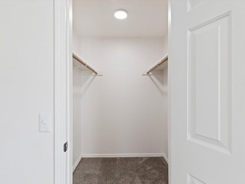 Closet with Recessed Lighting | Spring Creek Apartments