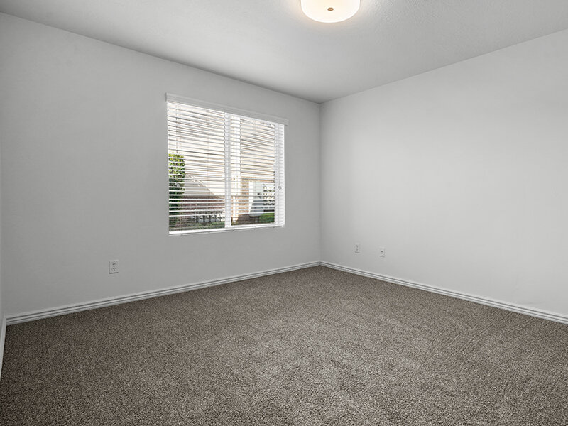 Carpeted Bedrooms | Settlers Landing Apartments in West Haven, UT