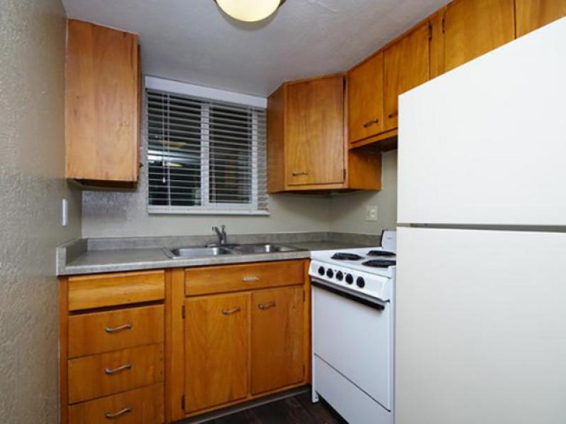 Kitchen with White Appliances | The New Broadmoor Apartments, Salt Lake City, UT