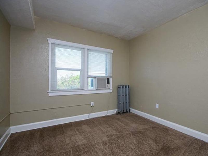 Carpeted Bedroom | The New Broadmoor Apartments, Salt Lake City, UT