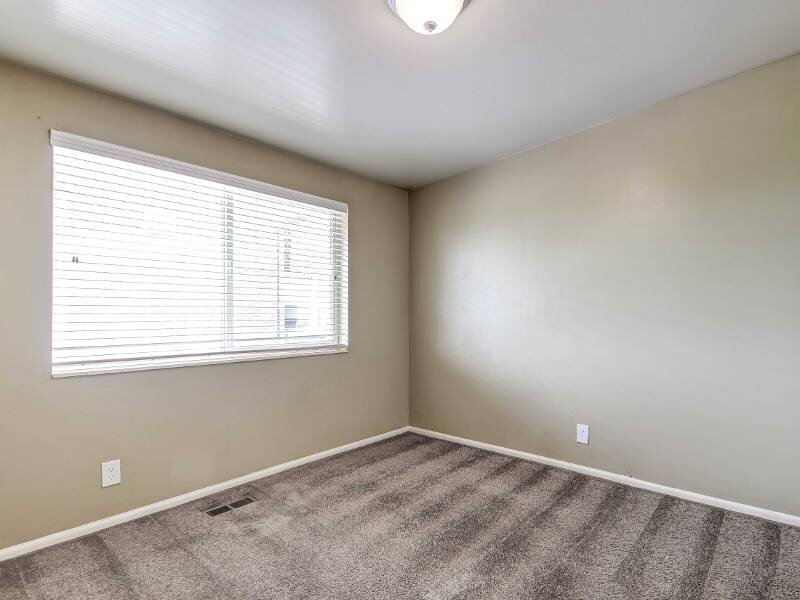 Bedroom with Large Windows | The New Broadmoor Apartments in SLC, UT