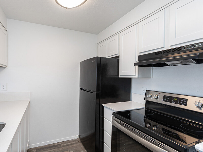 Kitchen with Black Appliances | Liberty Heights Apartments