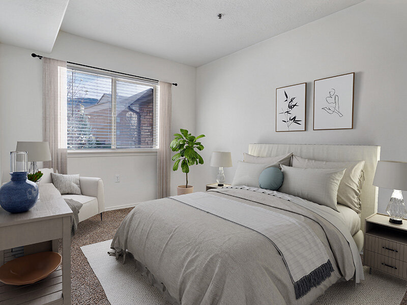 Bedroom with Window and Nightstand with Lamp | Wasatch Commons