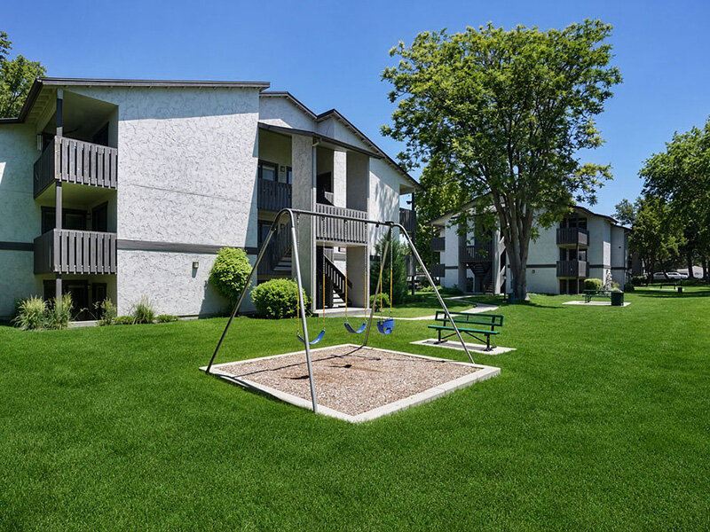 Exterior Apartment Complex with Playground | Elmwood