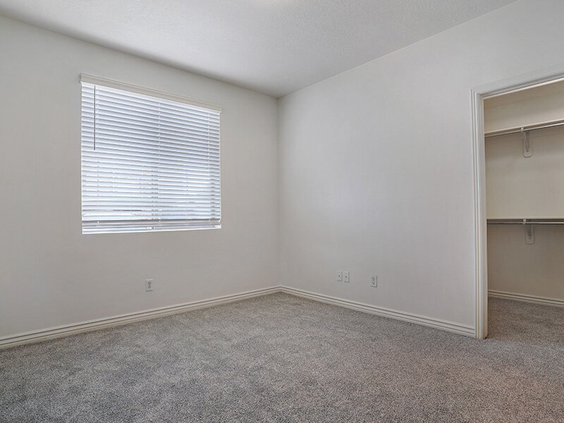 Bedroom with Window and Blinds with Carpeted Flooring | Eastgate at Greyhawk
