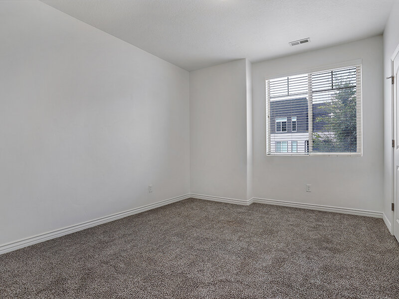 Bedroom with Carpet and Window | Eastgate at Greyhawk