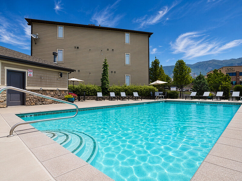 Outdoor Community Swimming Pool with Seating | Eastgate at Greyhawk