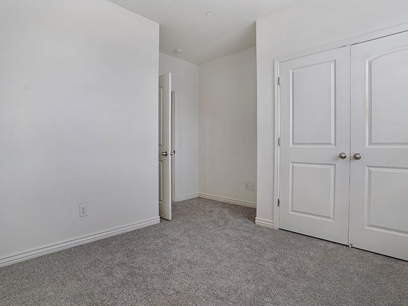 Bedroom with Carpeted Flooring and Closet | Eastgate at Greyhawk