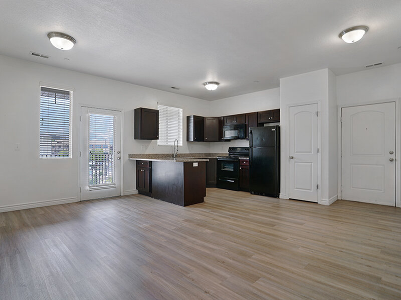 Kitchen with Windows and Wood Style Flooring | Eastgate at Greyhawk