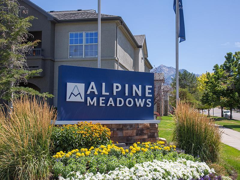Sign in Flower Bed | Alpine Meadows