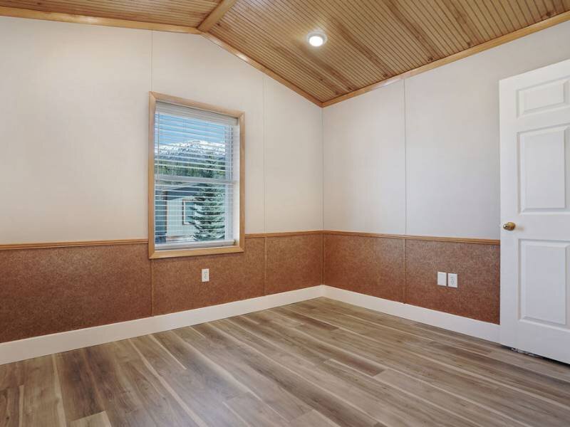 Bedroom with Wood Like Flooring | Targhee Place