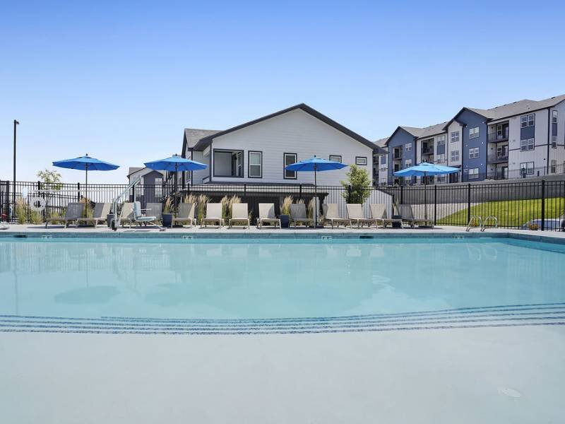 POOL WITH LOUNGE CHAIRS l Valley View Apartments