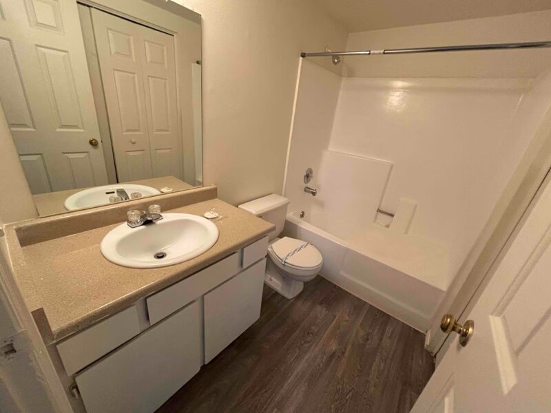 Bathroom with Shower/Tub and Bathroom Mirror | Woods Crossing