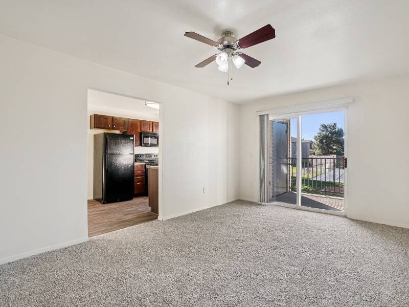 Front Room with a Ceiling Fan | Village Park Apartments