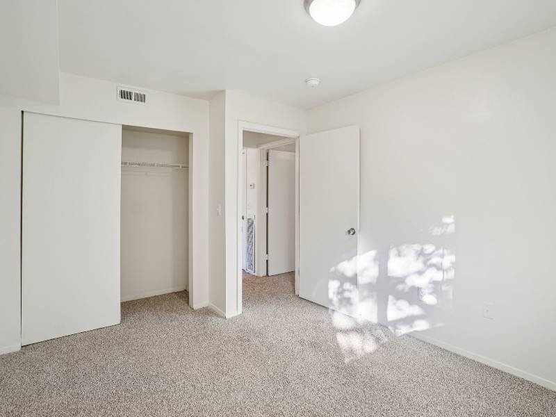 Bathroom with Sliding Closet Doors | Village Park Apartments