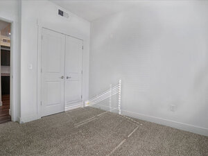 Bedroom with Closed Closet Doors | Mill Point