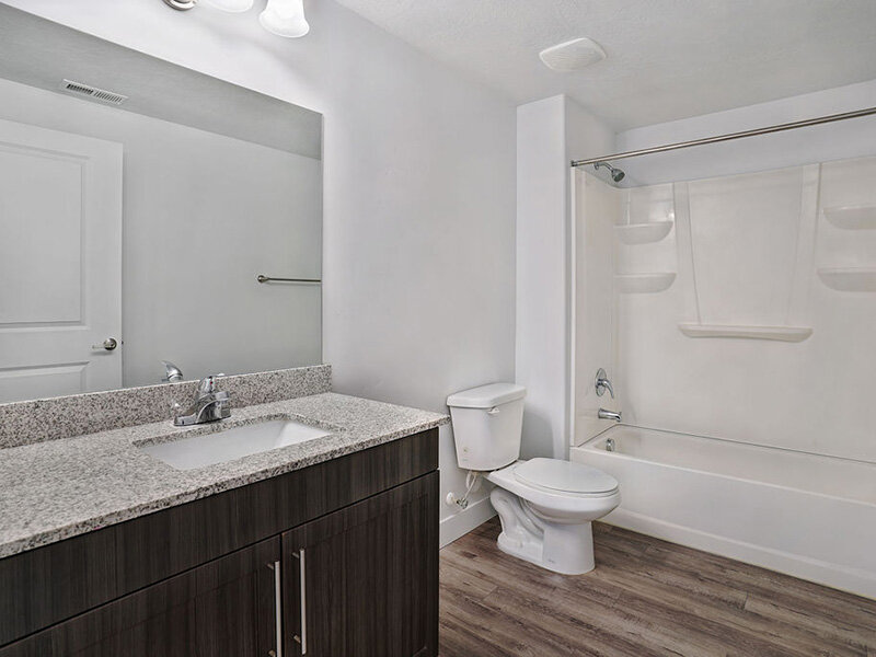 Bathroom with Wood Styled Flooring and Shower | Mill Point