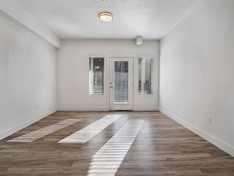 Apartment Entrance with Wood Styled Flooring and Ceiling Light | Mill Point