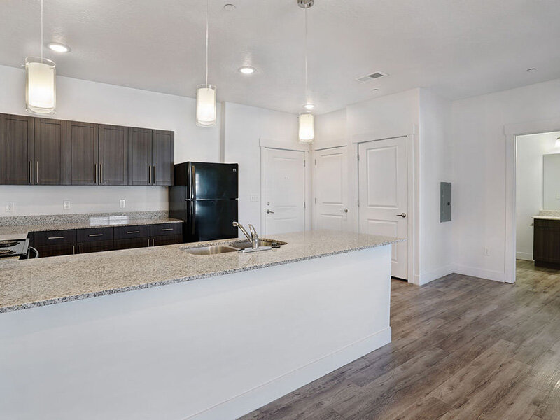 Kitchen with Ceiling Lights and Marble Styled Countertops | Mill Point