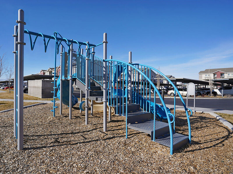 Outdoor Playground with Apartment Parking | Mill Point
