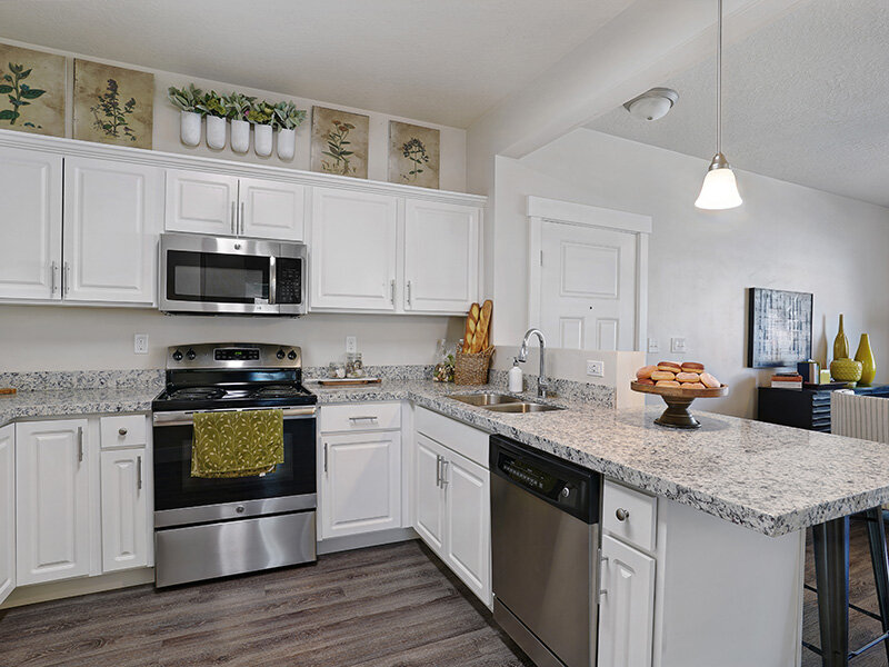 Kitchen Apartment Area with Wood Styled Floors | Draper Village