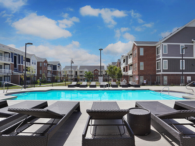 Community Lounge Seats and Pool | Draper Village