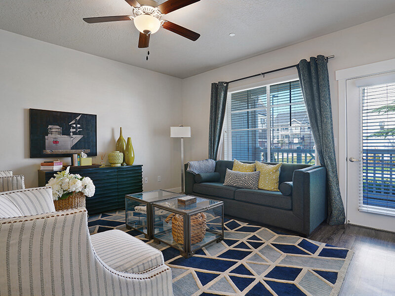 Living Room with Ceiling Fan and Light with Seating | Draper Village