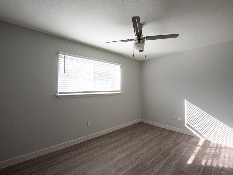 Bedroom with Ceiling Fan | The Park Apartments in Bountiful, UT