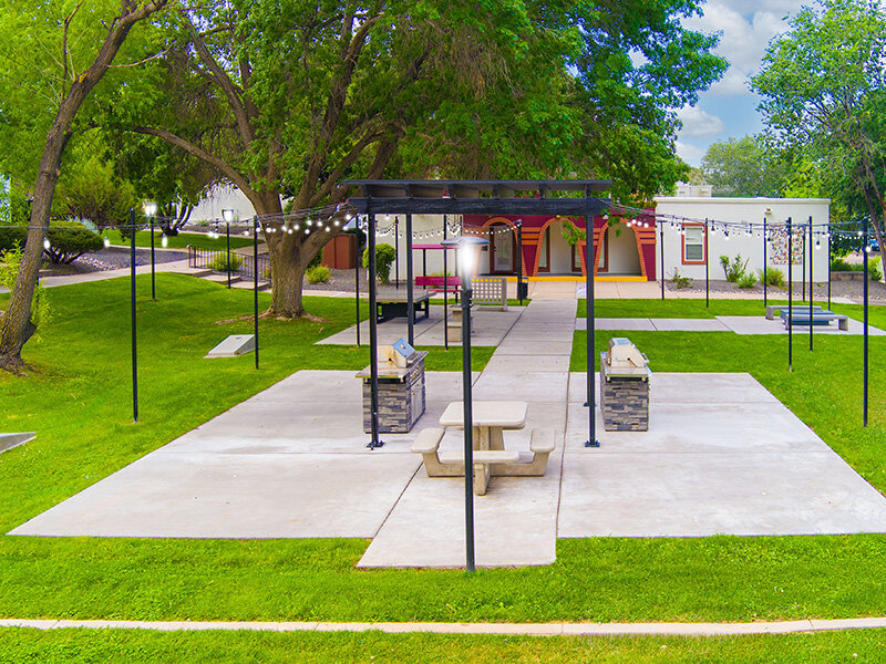 Outdoor BBQ Area with Pavilion and Seats with Trees | Artista