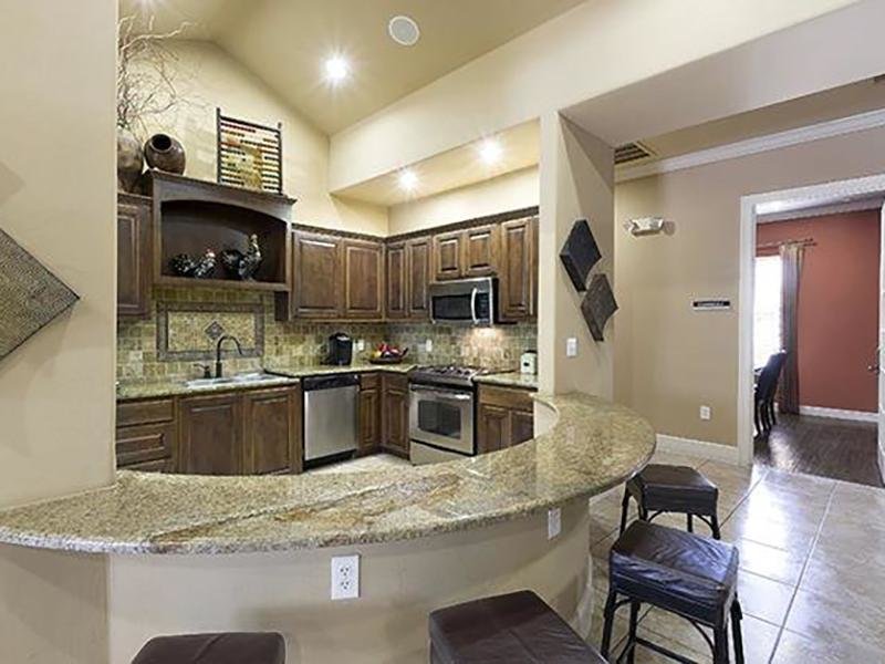 Clubhouse Kitchen - The Falls Apartments - TX