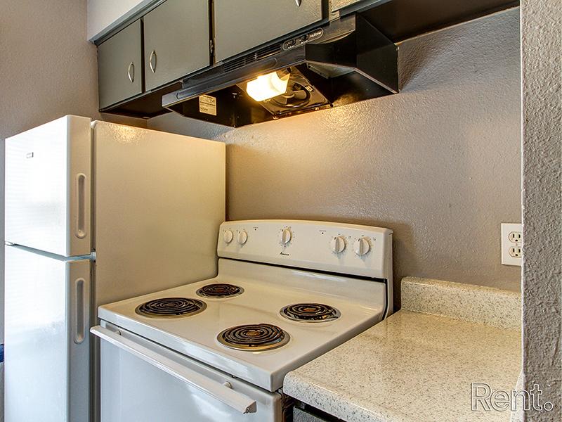 Kitchen with White Appliances | Norman Creek Apartments in Norman, OK