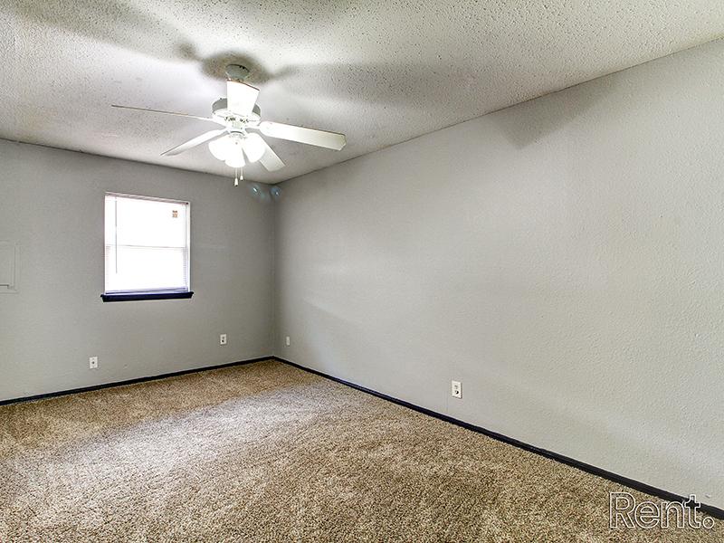 Carpeted Bedroom | Norman Creek Apartments in Norman, OK