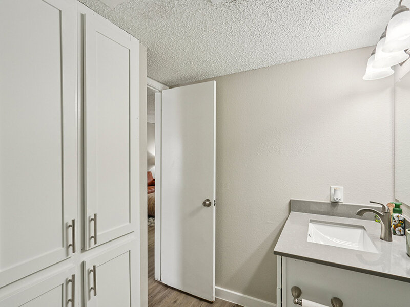 Bathroom with Linen Closet | Villas on Rosemeade East Apartments