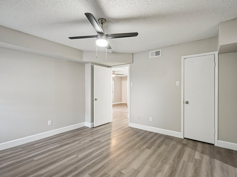 Bedroom with Wood Flooring | Villas on Rosemeade East Apartments