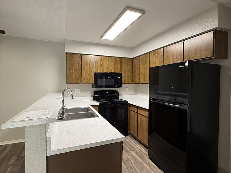 Black Appliances in Kitchen | PEA 2x2B | Willow Ridge