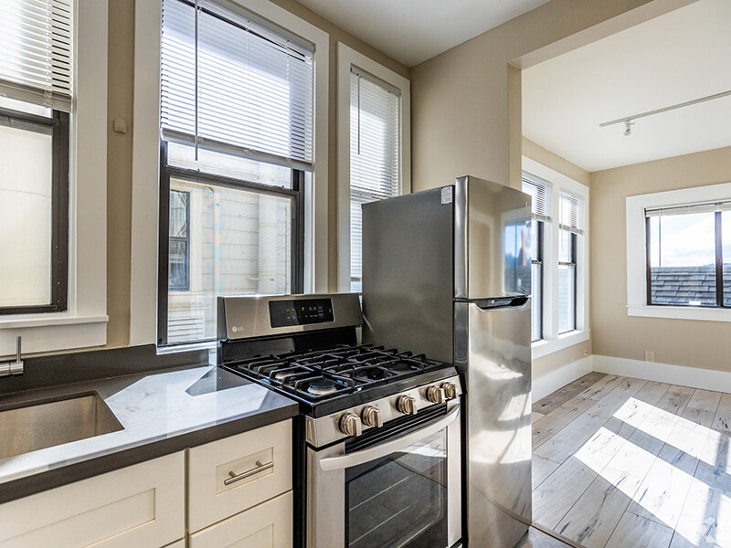Kitchen with Stainless Appliances | 3201 Washington Apartments