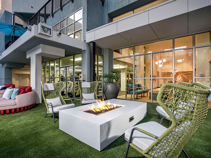 Outdoor Lounge with Firepit | The Oasis Apartments