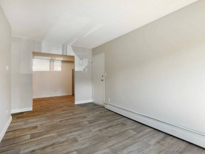 Living Area with Wood Style Flooring | Ascent at Havana Apartments