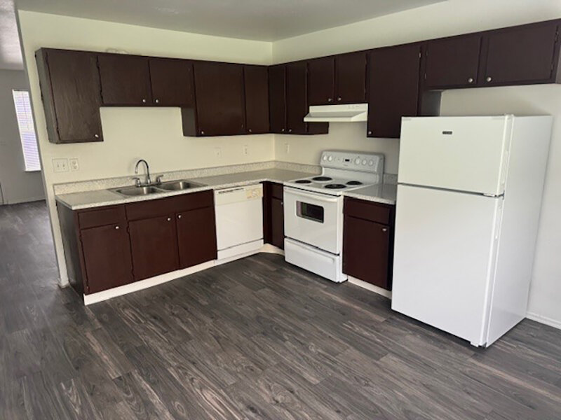 Kitchen Appliances with Wood Style Flooring | Mulberry Park