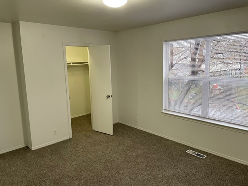 Carpeted Bedroom with Window and Ceiling Light | Mulberry Park