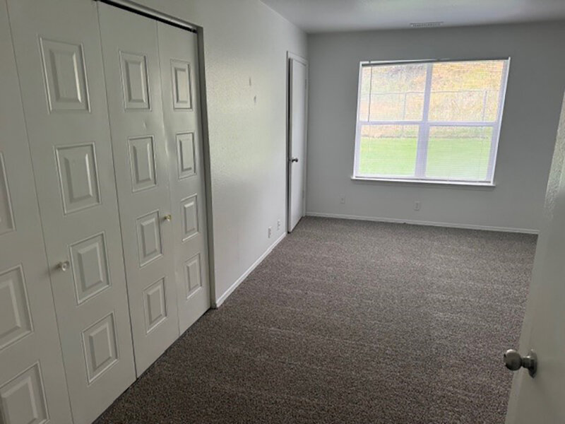 Carpeted Bedroom with Window and Closet | Mulberry Park