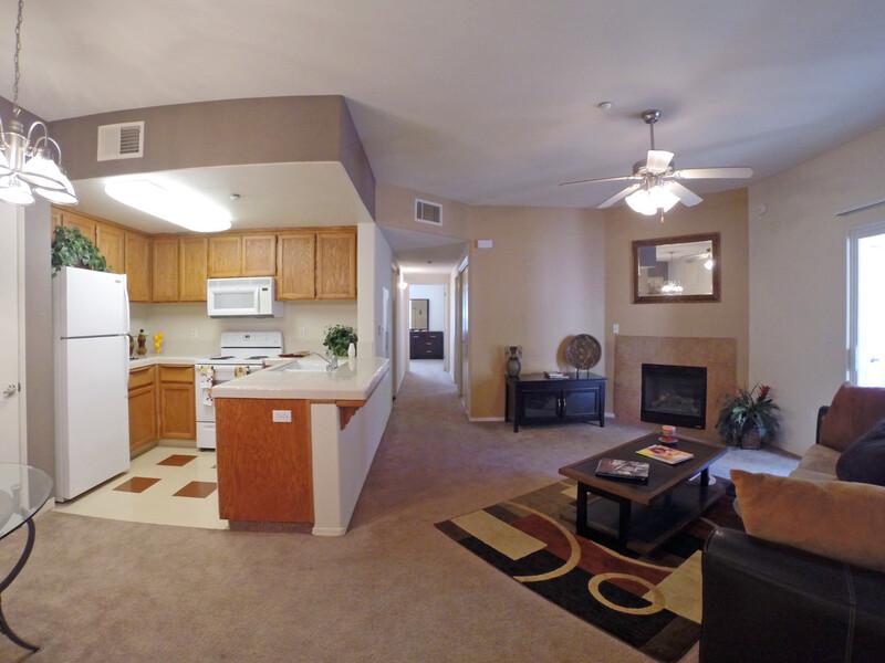 Front Room and Kitchen | Luxe West Apartments in Fresno, CA