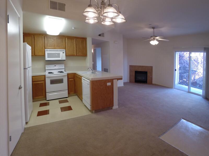 Kitchen and Living Room | Luxe West Apartments in Fresno, CA