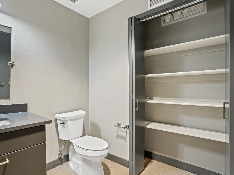 Bathroom with Linen Closets | 9th East Lofts