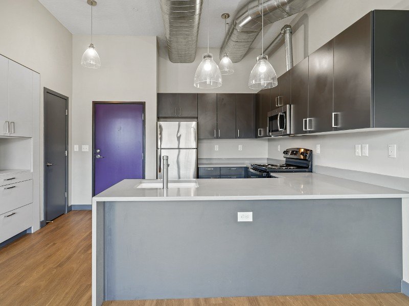 Kitchen with Stainless Steel Appliances | 9th East Lofts